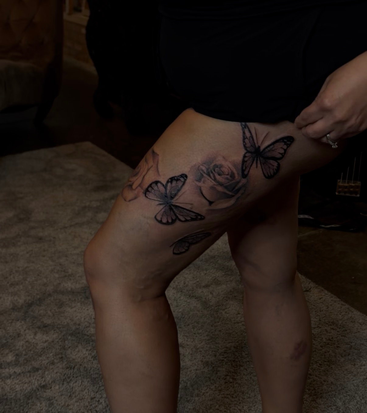 Butterflies and rose thigh tattoo
